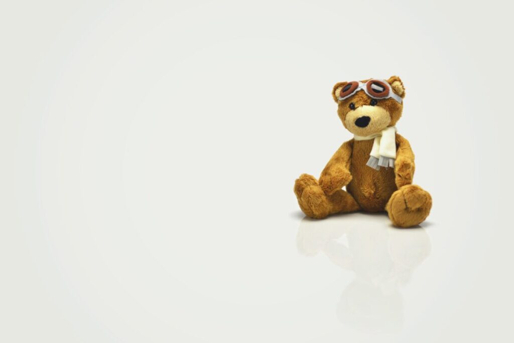 toys r us - teddy bear sitting on floor